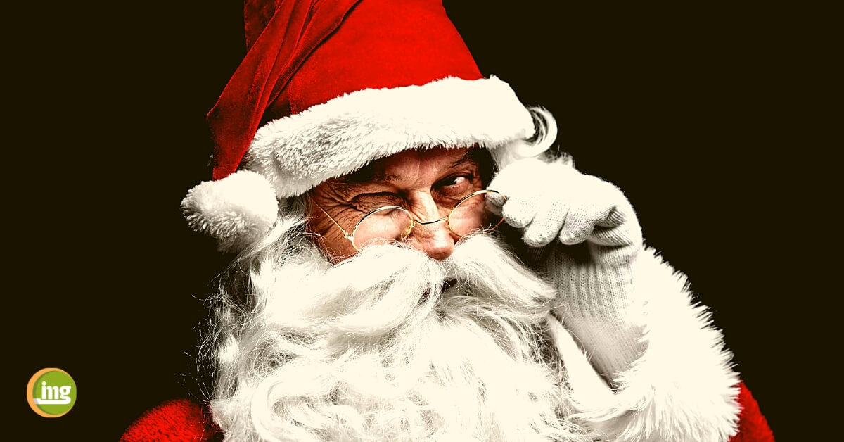 Nikolaus zwinkert mit Brille: Nascherei an Nikolaus und im Advent. So bleiben Kinderzähne gesund bei Information Mundgesundheit